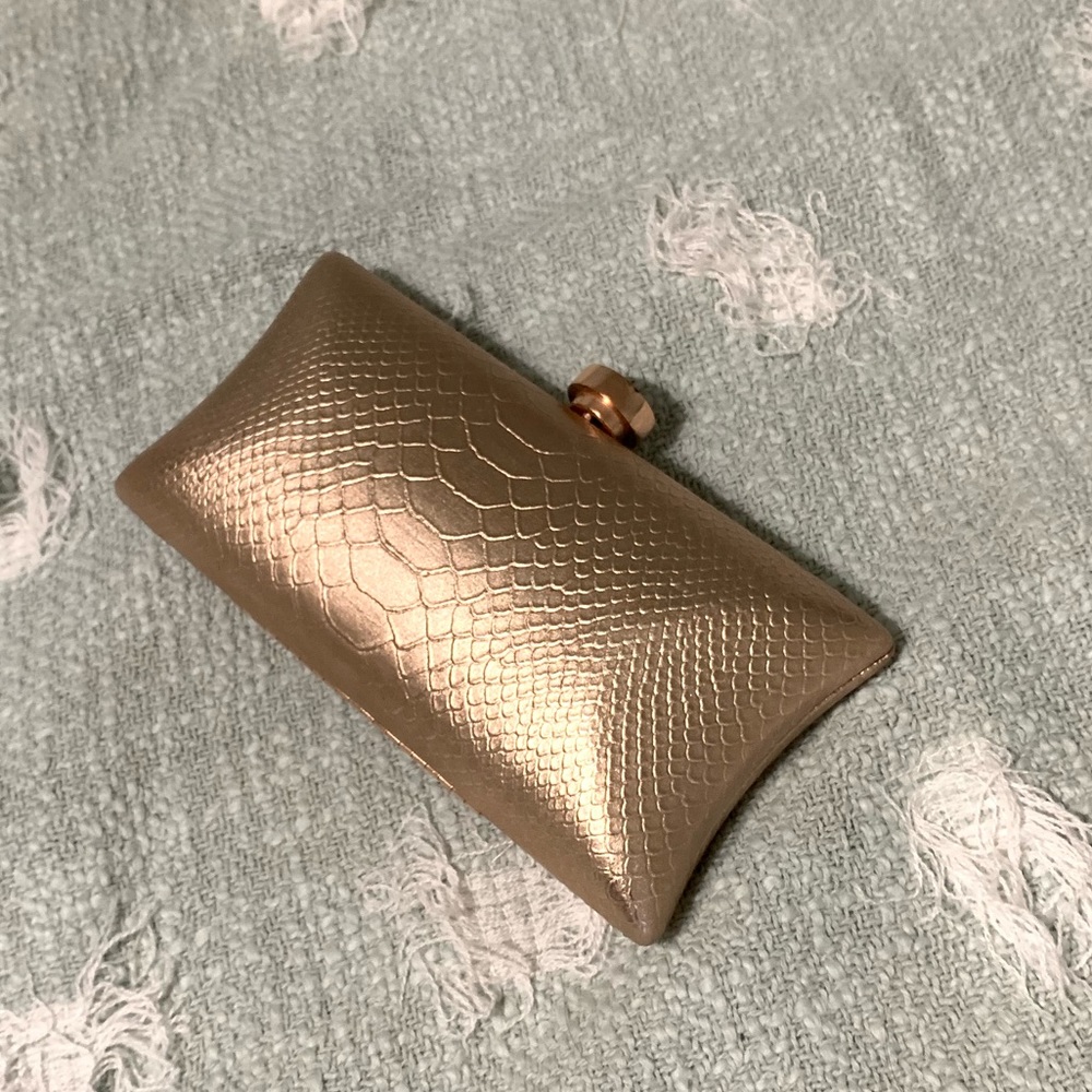 vince camuto rose gold clutch